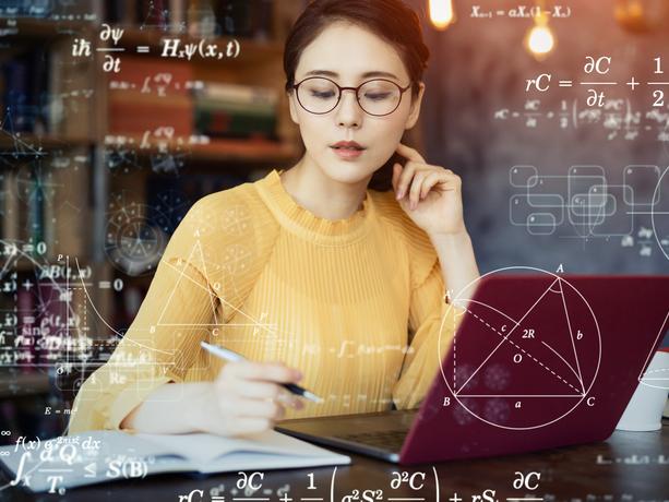 Woman figuring out equations